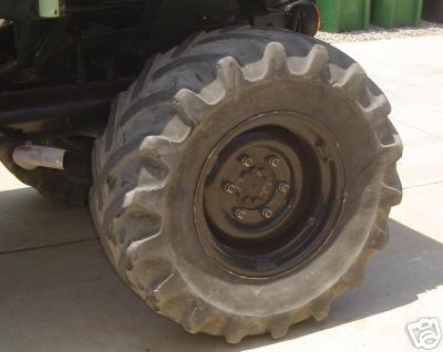 1991 Ford Bronco - Close-up view of a heavy-duty tire and wheel assembly on a vehicle.