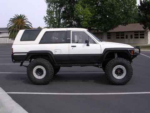 1985 Toyota 4Runner - This modified Toyota 4Runner features oversized tires and a lifted suspension, suggesting it's built for off-road use.