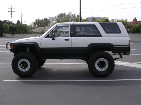 1985 Toyota 4Runner - This modified 1985 Toyota 4Runner features a two-tone paint scheme and significant suspension lift.