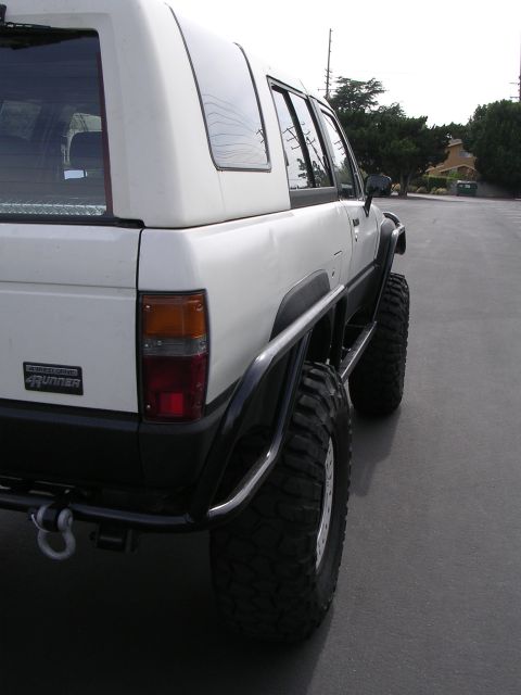1985 Toyota 4Runner - This modified Toyota 4Runner features aggressive off-road tires and protective roll bars.