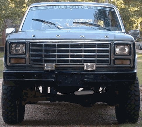 Front of a lifted square-body Ford Bronco, FORD grille and BRONCO windshield banner