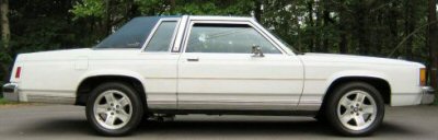 1985 Ford LTD Crown Victoria - This 1985 Ford Crown Victoria LTD coupe displays its distinctive body style from a side profile.