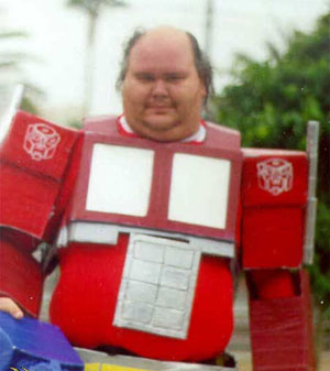 1991 Ford Bronco - A person dressed as Optimus Prime from Transformers.