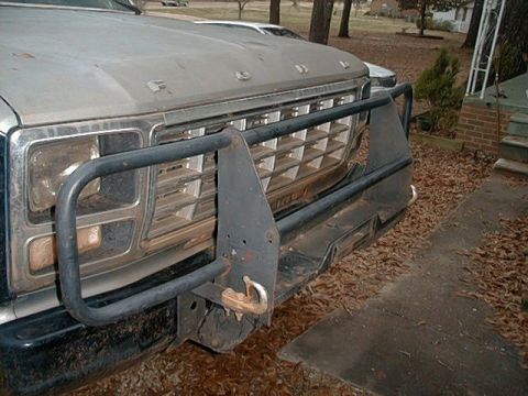 1980 Ford Bronco - This 1980 Ford Bronco features a prominent brush guard and a distinctive diamond-patterned grille.