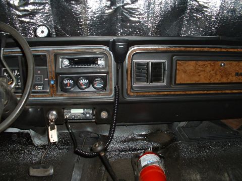 1978 Ford Bronco - Interior view of a 1978 Ford Bronco, aftermarket gauges and radio.