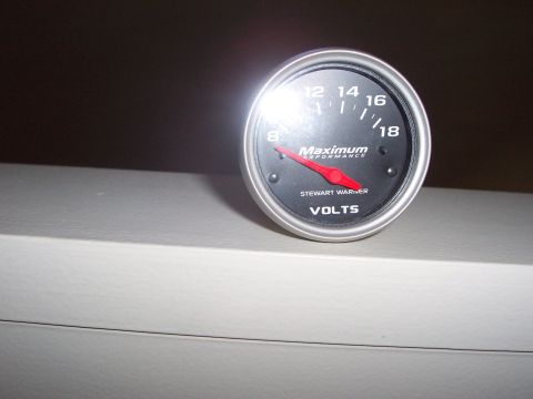 1993 Ford Probe - A Stewart Warner Maximum Performance volts gauge is shown, with the needle indicating a reading of 8.