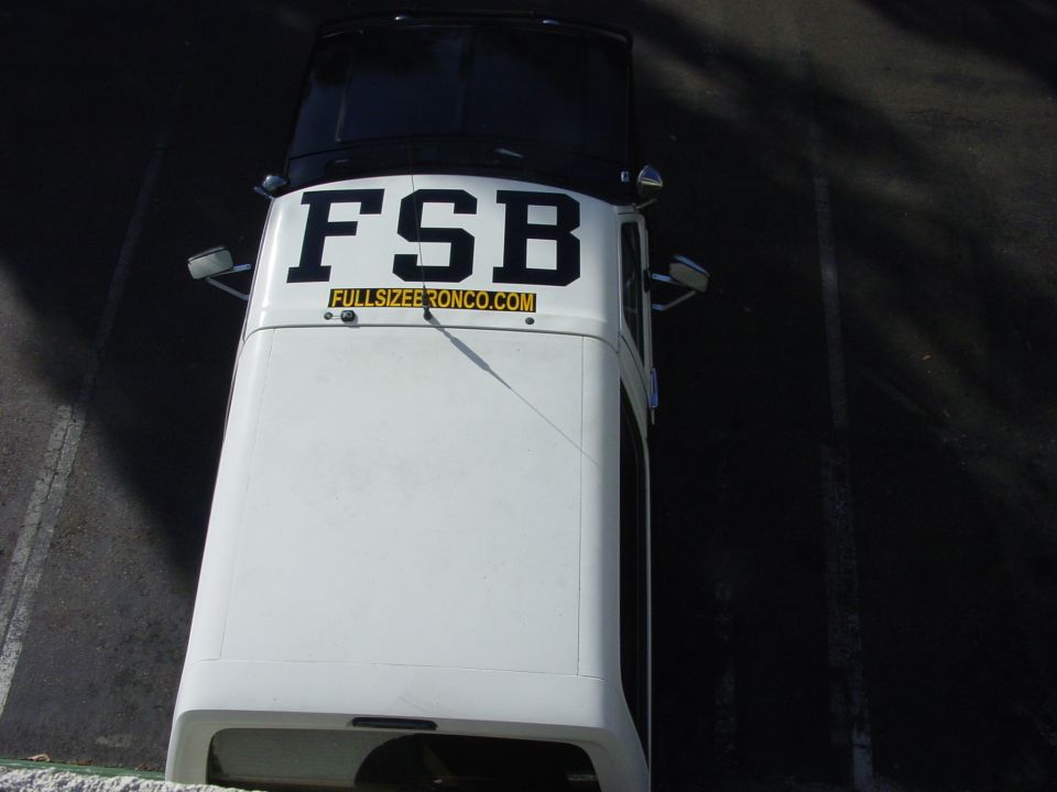 White Bronco with FSB and FULLSIZEBRONCO.COM lettering on roof