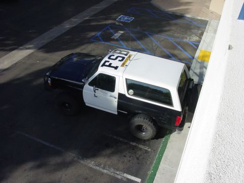 1994 Ford Bronco - This 1994 Ford Bronco features a two-tone black and white paint scheme with 'FSB' lettering on the roof.