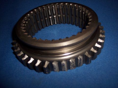 1972 Ford Ranchero - A close-up view of a metal gear synchronizer ring, a component used in vehicle transmissions.