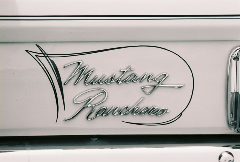 Chrome emblem reads 'Mustang Ranchero' with decorative pinstriping