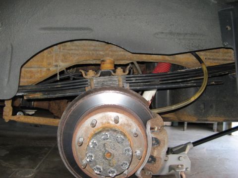 2001 Ford Excursion - This shows the stance of my modded F code springs with the 1/8" shim and 5/8" thick spacer included in the spring pack. (Half a tank of gas…
