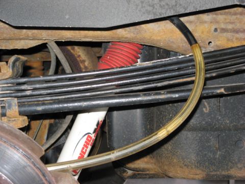 2001 Ford Excursion - This shows the stance of my modded F code springs with the 1/8" shim and 5/8" thick spacer included in the spring pack. (Half a tank of gas…