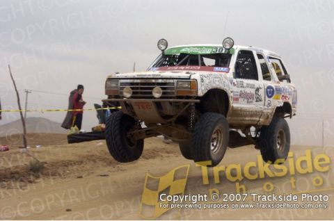 1992 Ford Explorer - This modified 1992 Ford Explorer is captured mid-air during an off-road race event.