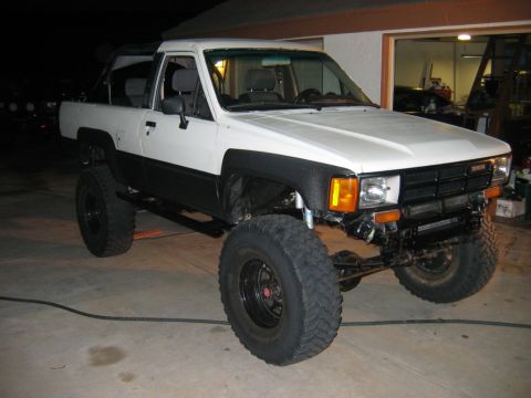 1985 Toyota 4Runner - Modified 1985 Toyota 4Runner features a two-tone paint scheme and significant suspension lift.