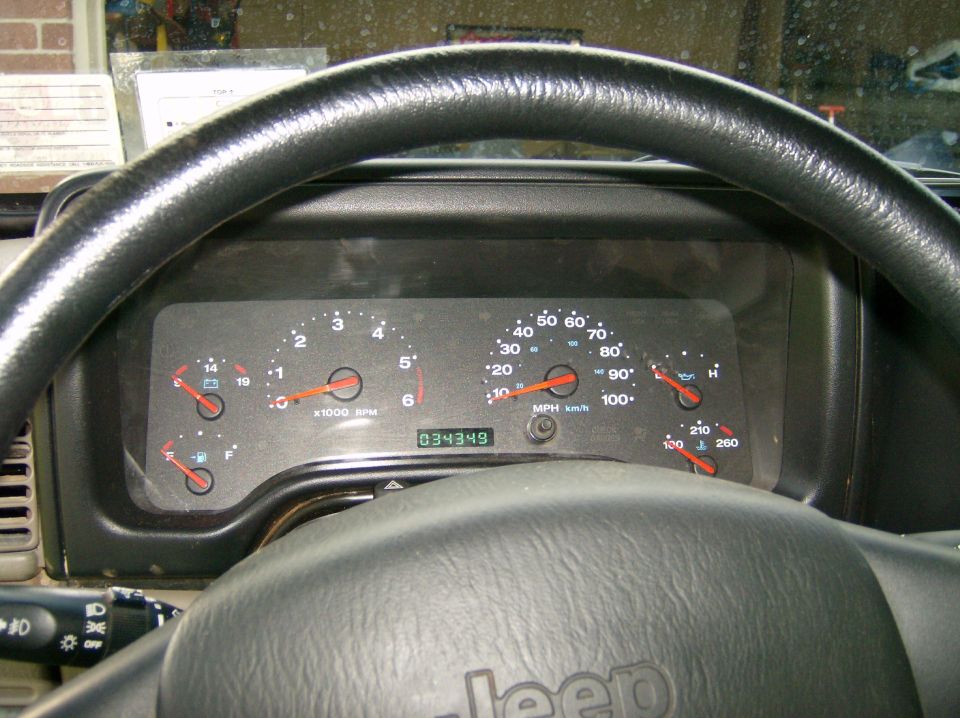 2004 Jeep Wrangler dashboard with odometer showing 034349 miles