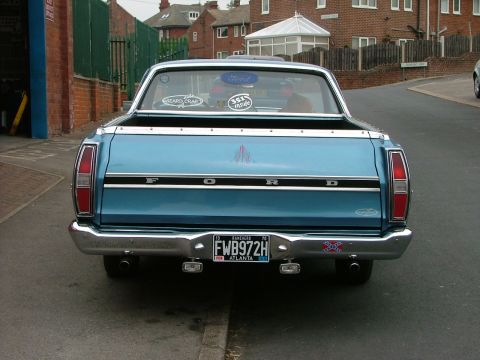 1970 Ford Ranchero - Rear view of a blue 1970 Ford Ranchero pickup truck parked on a street.