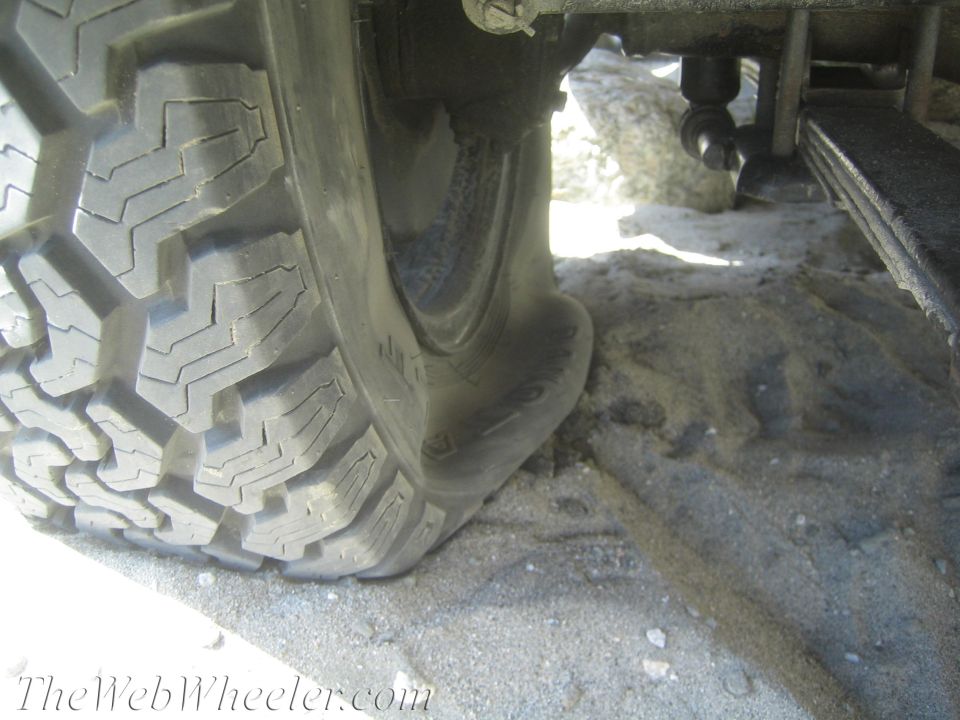 Tire on sand with a flat spot