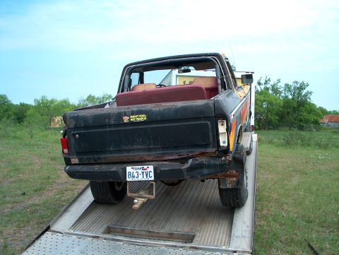 1979 Ford Bronco - Rear view of a 1978 Ford Bronco being loaded onto a tow truck.