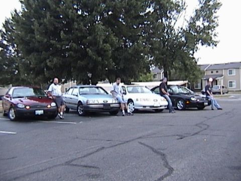 1993 Ford Taurus - 8/17/02 TCCA meet - Indy from L-R Jims Duratec, Adams Vulcan, my SHO and Erics Duratec