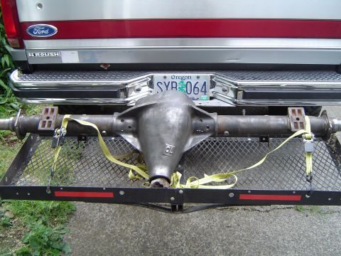 1978 Ford Bronco - A rear axle assembly is secured to a trailer, with an Oregon license plate visible on the vehicle above.
