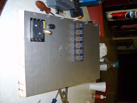 2004 Ford Crown Victoria - A custom-built electrical panel with several relays and a main connector is shown, likely for automotive use.