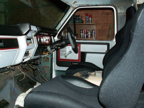 1983 Ford Bronco - Bucket seats from e-bay, dash and trim recolour from rattle can, steering wheel and column hub from local auto parts store....will look gre…
