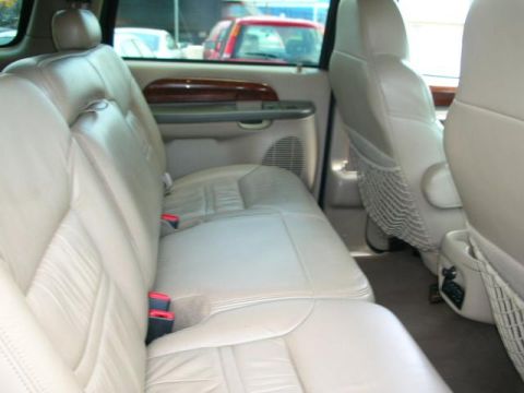 2000 Ford Excursion - Interior shot of a 2000 Ford Excursion, focusing on the rear seating area.