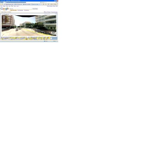 1991 Ford Bronco - Screenshot of Google Street View on a city street with buildings and vehicles.