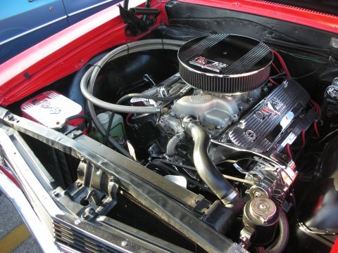1998 Ford Crown Victoria - Close-up view of a modified engine bay, polished components and a custom air intake system.
