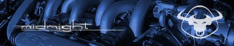 1993 Ford Taurus - Engine detail the word 'midnight' and a stylized bull emblem.