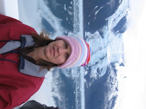 1973 Ford Ranchero - A woman poses for a photo in front of a large glacier in Alaska.