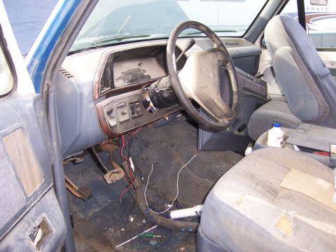1991 Ford Bronco - Interior view of a 1991 Ford Bronco, showing the dashboard and seats.
