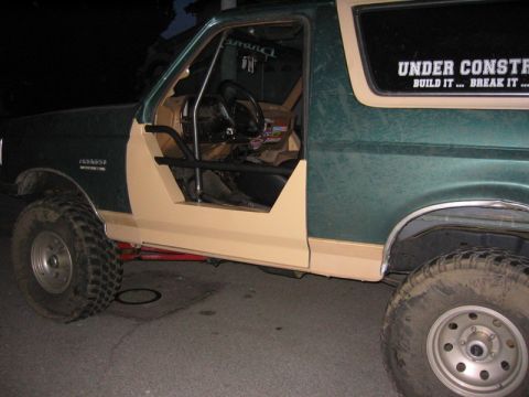 1991 Ford Bronco - This 1991 Ford Bronco is undergoing modifications, a removed door and roll cage.