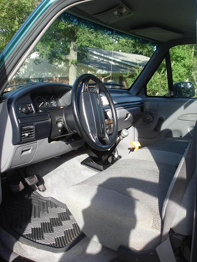 1996 Ford F-150 - Interior view of a 1996 Ford F-150 pickup truck, including the dashboard and seating.