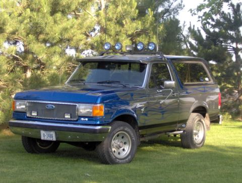 1987 Ford Bronco - 1987 Ford Bronco with aftermarket lights and roof rack.