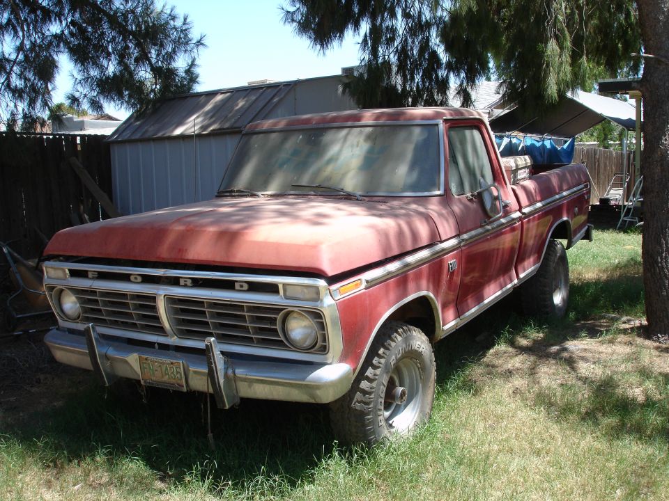 Red 1977 Ford F-150 pickup truck, 3q-front view