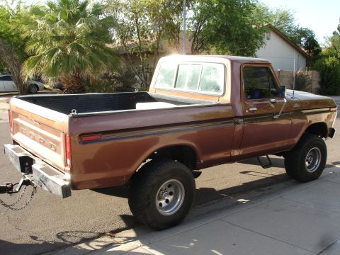 1977 Ford F-150 - This 1977 Ford F-150 pickup truck is brown and has been lifted.