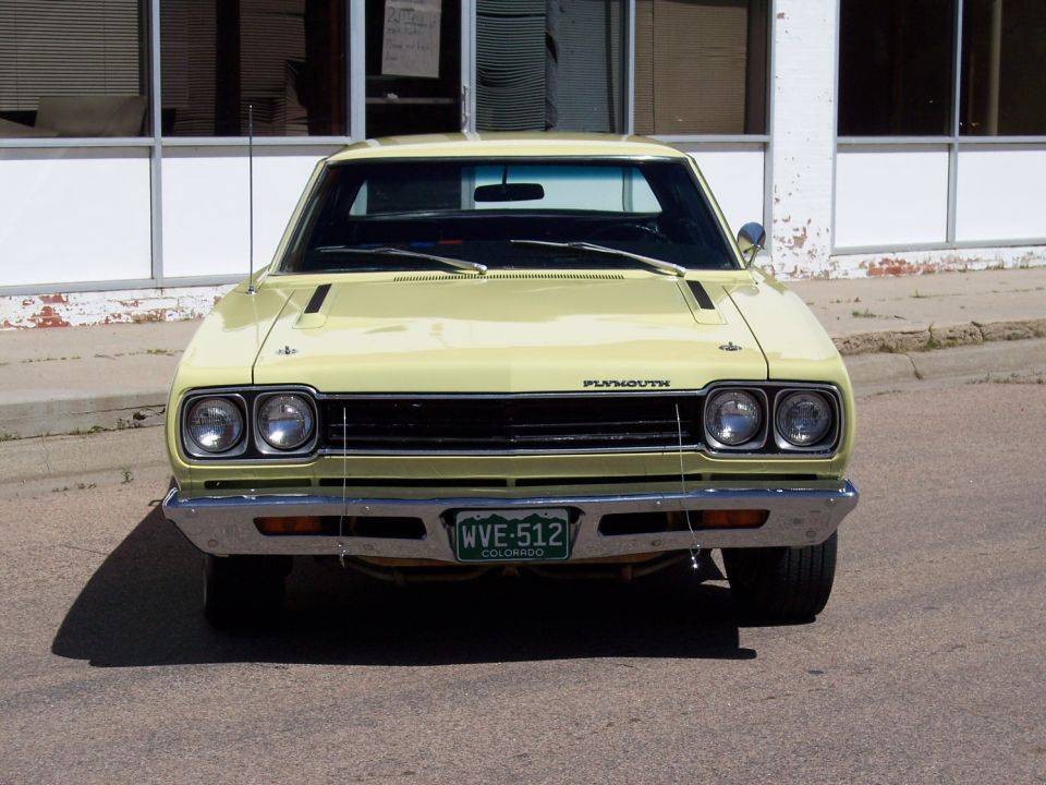 Front view of a yellow 1970 Plymouth Road Runner with Colorado license plate WVE-512
