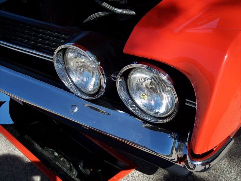 1972 Ford Ranchero - Close-up of the front of a 1972 Ford Ranchero, showing its distinctive grille and headlights.