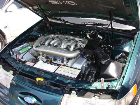 1993 Ford Taurus - The V8 engine of a 1993 Ford Taurus SHO is displayed with the hood open.