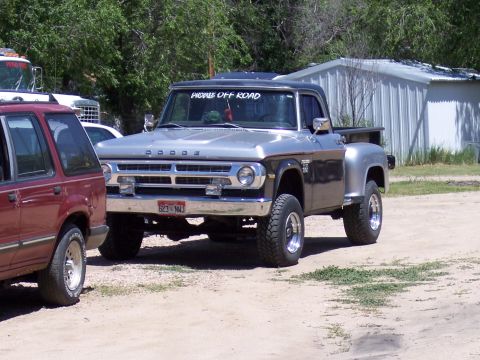 1972 Ford Ranchero - This Dodge pickup truck has a two-tone paint scheme and off-road tires.