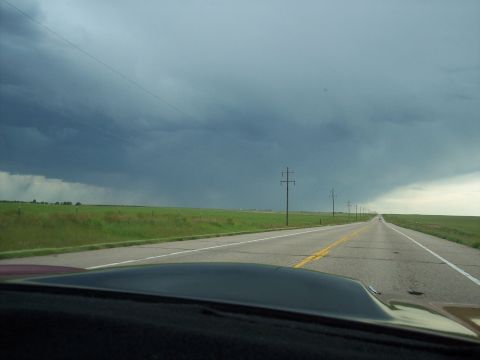 1972 Ford Ranchero - View from inside a vehicle traveling on a highway towards a storm.