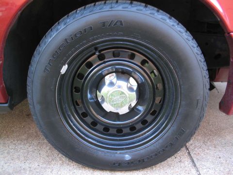 2001 Ford Crown Victoria - Stock size, V-rated, VERY good in the dry/wet, snow traction is OKAY.