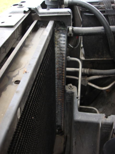 1983 Ford Bronco - the trany cooler lines are 1/2 i removed them as wel. you can see it was leaking this side too.