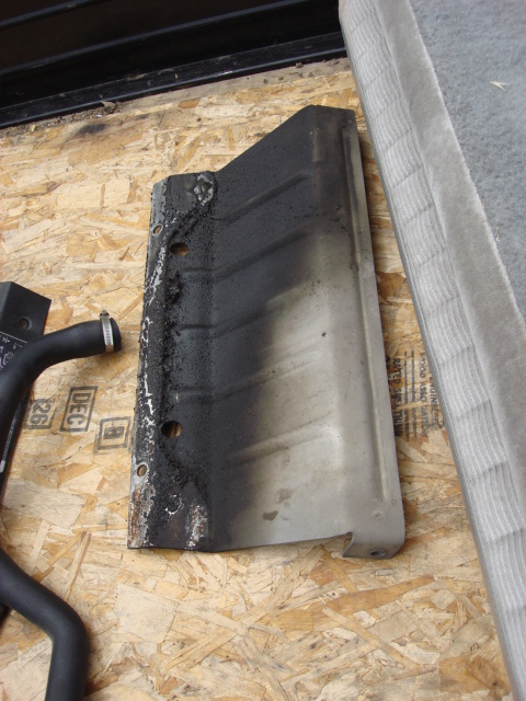 1983 Ford Bronco - to get the bottom shroud out you need to drop the front skid plate. i used a 10mm on the cross memebr and 15mm for the frame bolts.