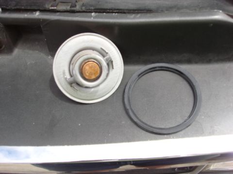 1983 Ford Bronco - here is the new part and the new gasket. they swapped to an o-ring so the swap was fast and painless.