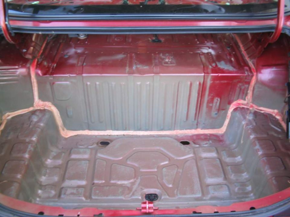 So I cleaned all that crap out, and installed a missing body plug (cause of the mess) in the trunk.
