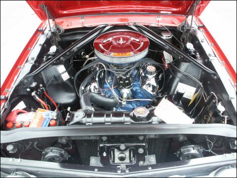 2001 Mercury Grand Marquis - The engine bay of a classic car, a blue engine block and chrome air cleaner assembly.