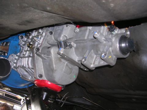 1975 Ford Ranchero - Underside view of a vehicle's transmission and exhaust system components.