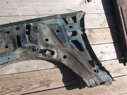 1994 Ford Bronco - This is a part of a vehicle, not a complete car, and its year cannot be determined from the image.